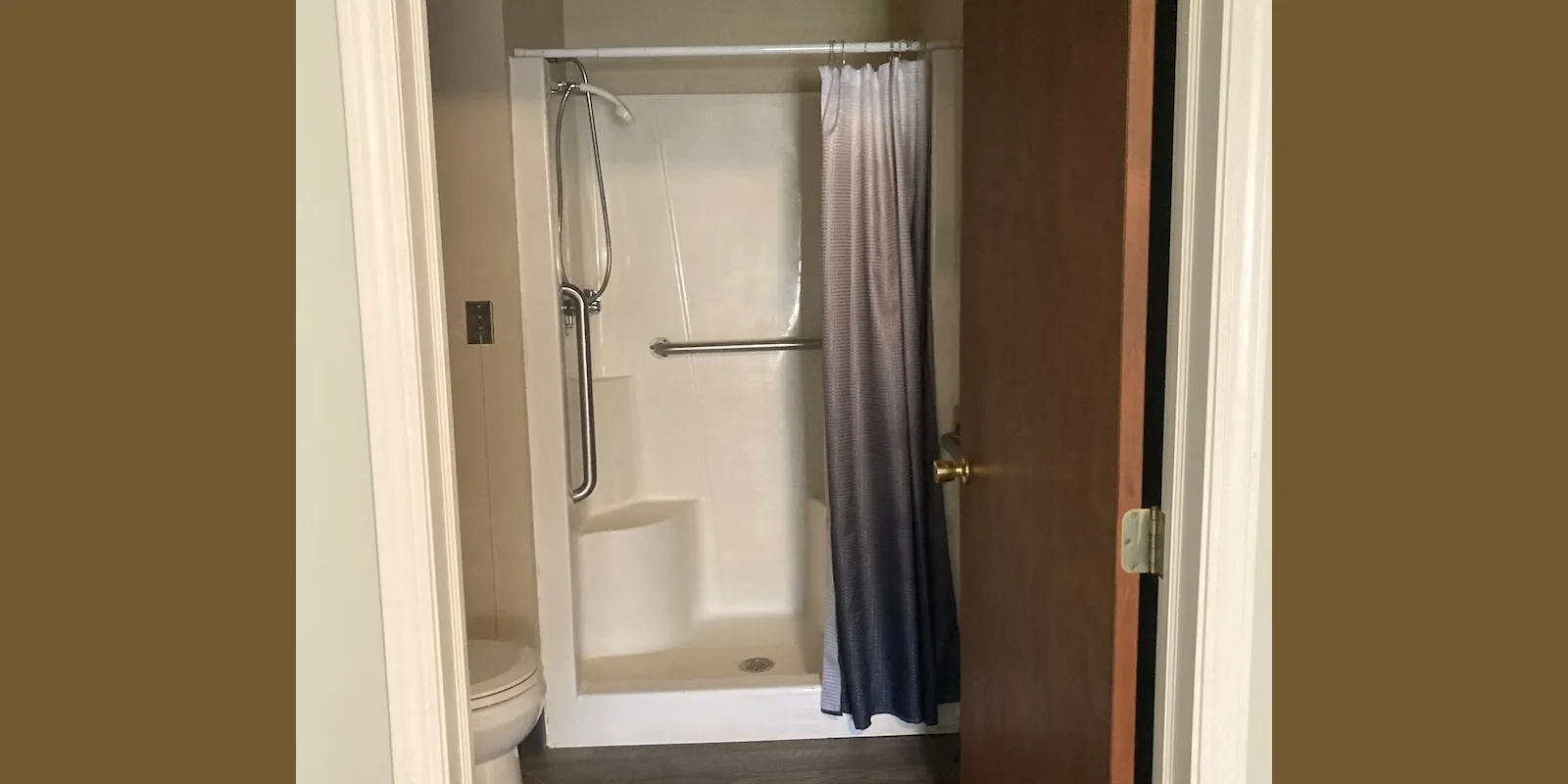 Recently-renovated bathroom with walk-in shower